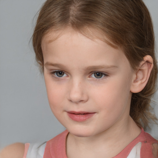 Joyful white child female with medium  brown hair and brown eyes