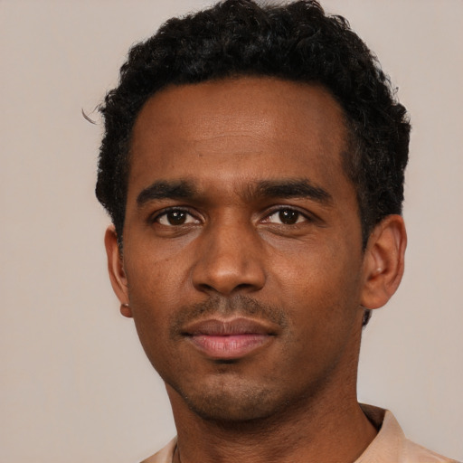 Neutral black young-adult male with short  black hair and brown eyes