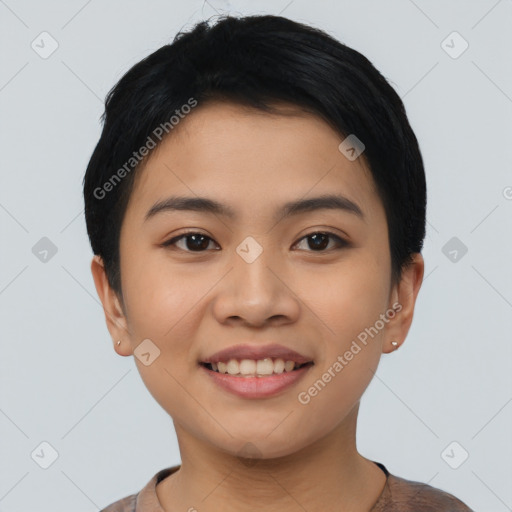 Joyful asian young-adult female with short  black hair and brown eyes