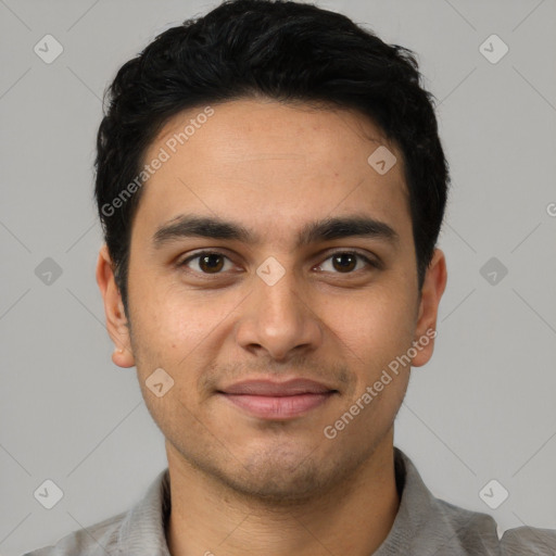 Joyful latino young-adult male with short  black hair and brown eyes