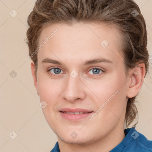 Joyful white young-adult female with short  brown hair and blue eyes