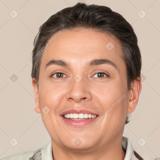 Joyful white adult male with short  brown hair and brown eyes