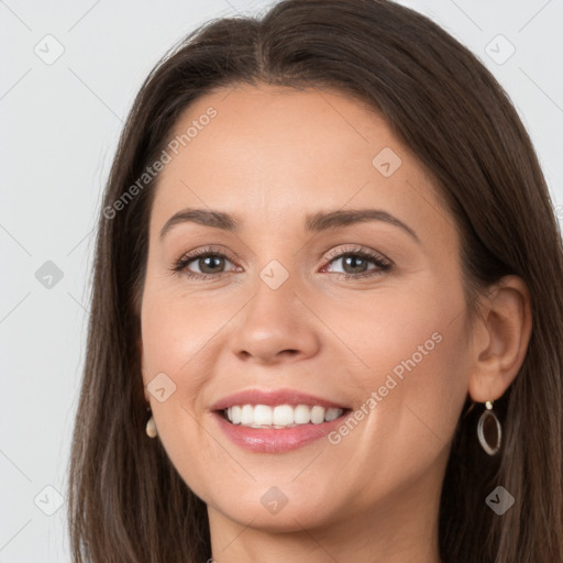 Joyful white young-adult female with long  brown hair and grey eyes