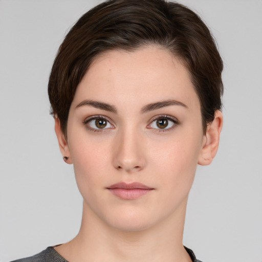 Neutral white young-adult female with short  brown hair and brown eyes