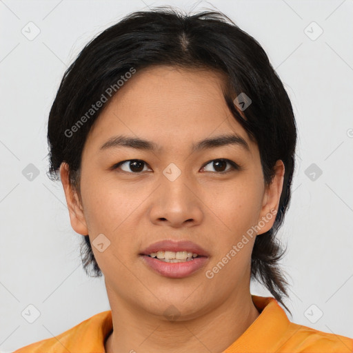 Joyful asian young-adult female with short  black hair and brown eyes