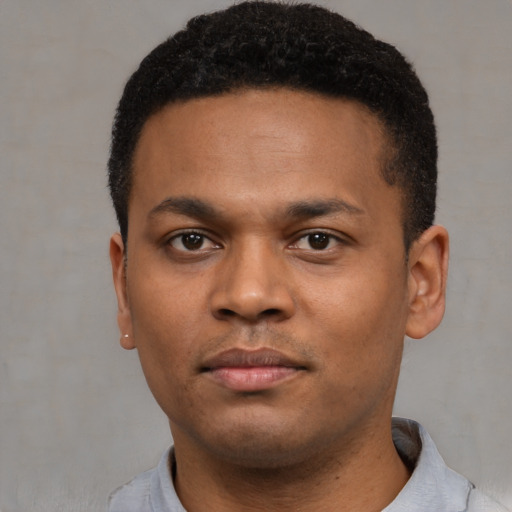 Neutral black young-adult male with short  black hair and brown eyes