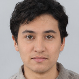 Neutral asian young-adult male with short  brown hair and brown eyes