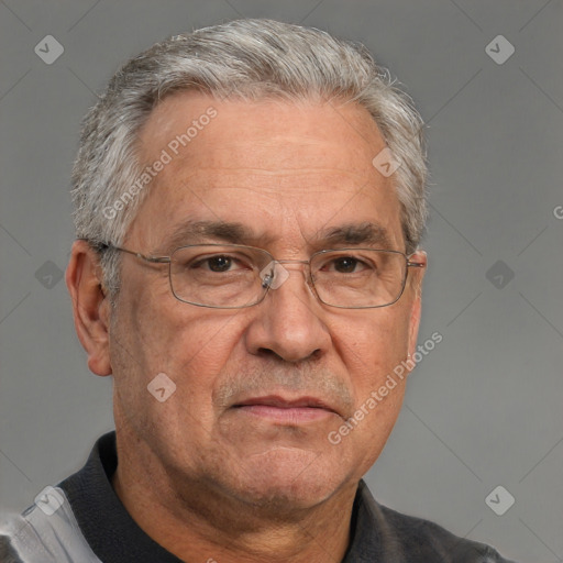 Neutral white middle-aged male with short  gray hair and brown eyes