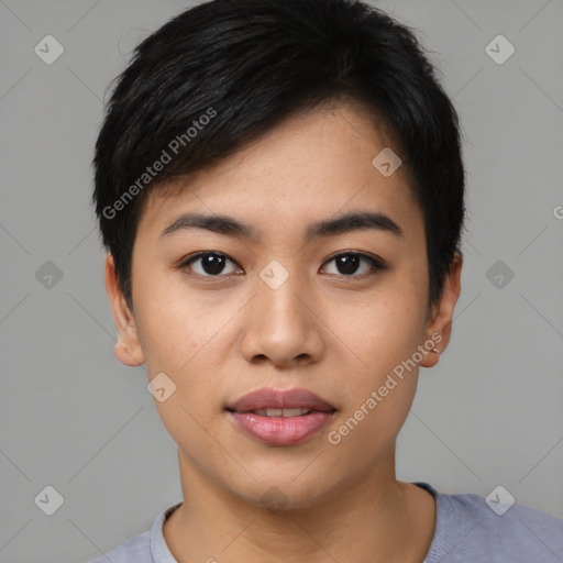 Joyful asian young-adult female with short  black hair and brown eyes