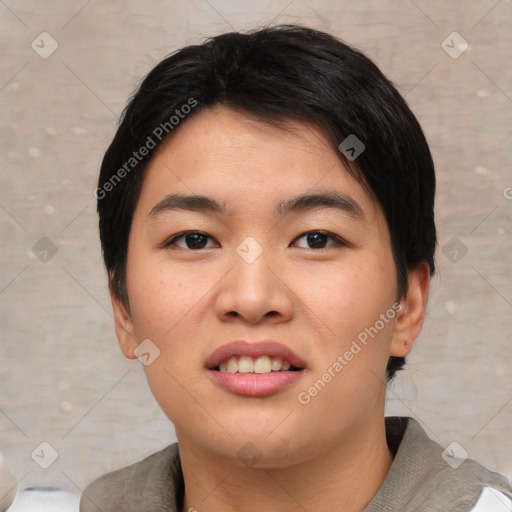 Joyful asian young-adult female with short  black hair and brown eyes