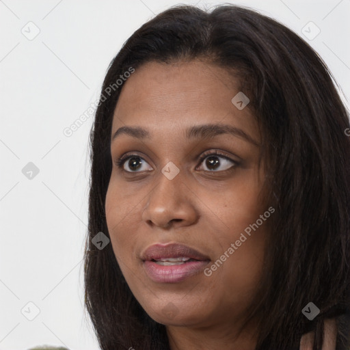 Joyful asian young-adult female with long  brown hair and brown eyes