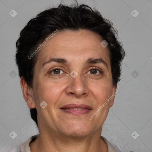 Joyful white adult female with short  brown hair and brown eyes