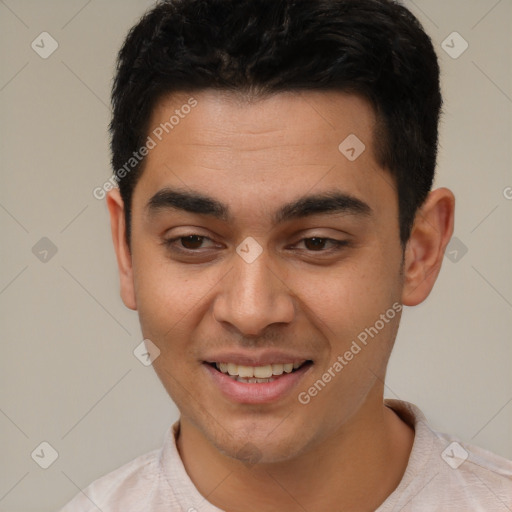 Joyful white young-adult male with short  black hair and brown eyes