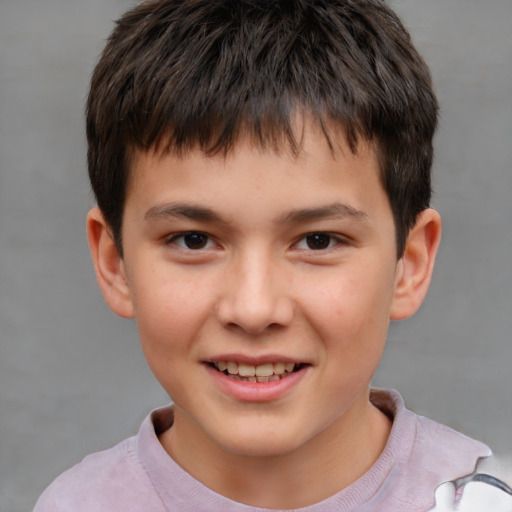 Joyful white child male with short  brown hair and brown eyes