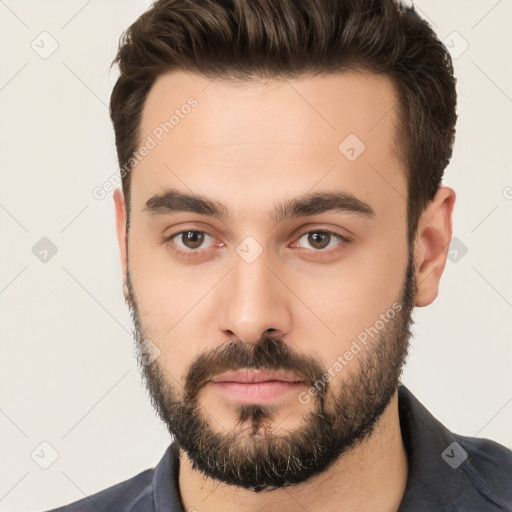 Neutral white young-adult male with short  brown hair and brown eyes