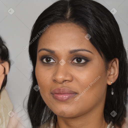 Joyful asian young-adult female with medium  brown hair and brown eyes