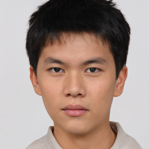 Neutral asian young-adult male with short  brown hair and brown eyes