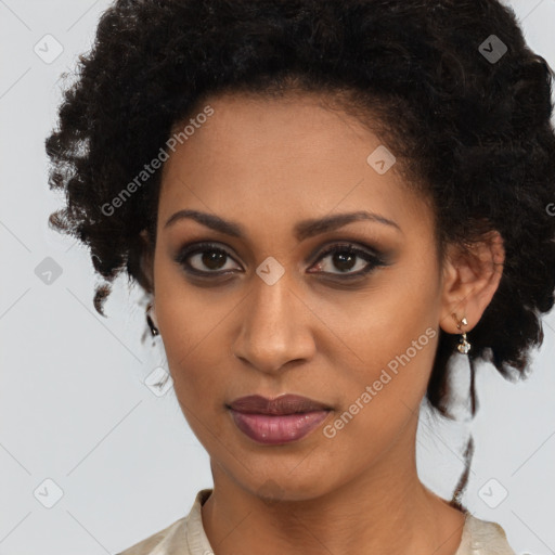 Joyful black young-adult female with medium  brown hair and brown eyes