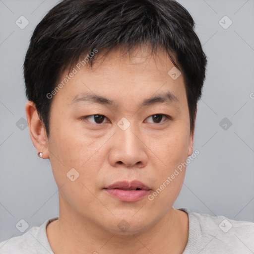 Neutral asian young-adult male with short  brown hair and brown eyes