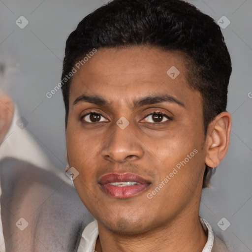 Joyful latino young-adult male with short  brown hair and brown eyes