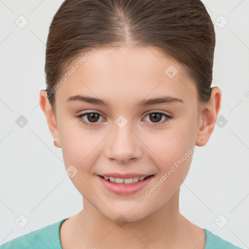 Joyful white child female with short  brown hair and brown eyes