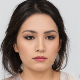 Neutral asian young-adult female with medium  brown hair and brown eyes