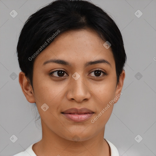 Joyful latino young-adult female with short  brown hair and brown eyes