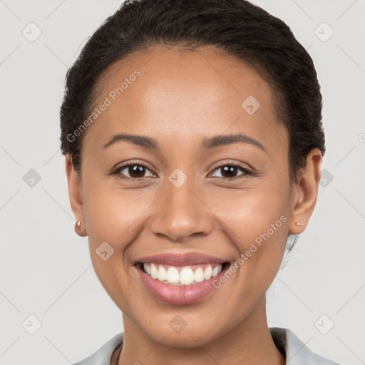 Joyful white young-adult female with short  brown hair and brown eyes