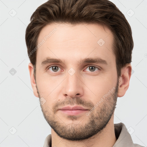 Neutral white young-adult male with short  brown hair and grey eyes