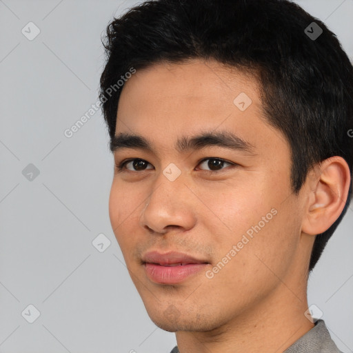 Neutral asian young-adult male with short  black hair and brown eyes