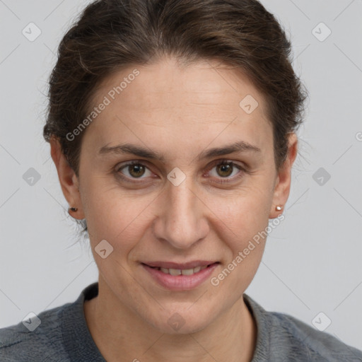 Joyful white adult female with short  brown hair and brown eyes