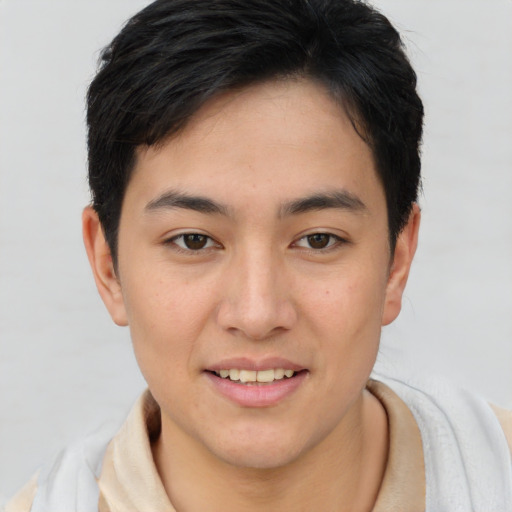 Joyful asian young-adult female with short  brown hair and brown eyes
