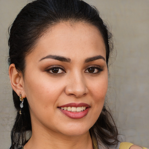 Joyful white young-adult female with medium  brown hair and brown eyes