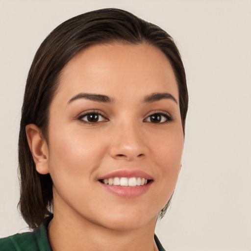 Joyful white young-adult female with medium  brown hair and brown eyes