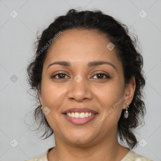 Joyful latino young-adult female with medium  brown hair and brown eyes