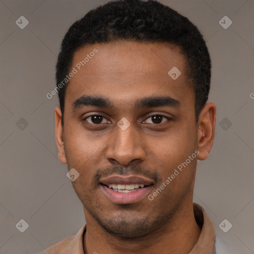 Joyful black young-adult male with short  black hair and brown eyes