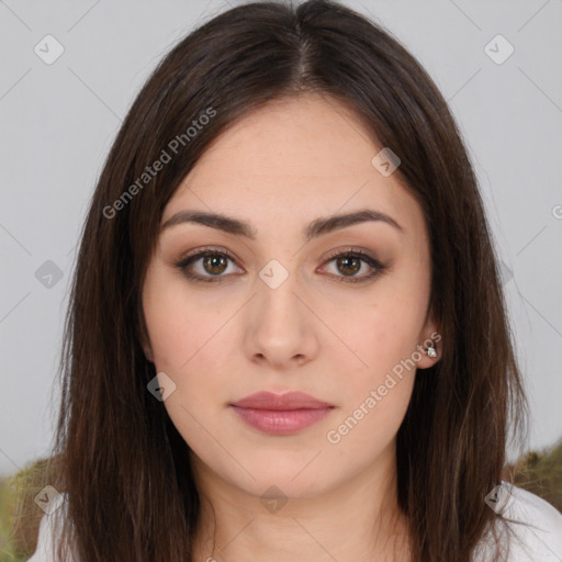 Neutral white young-adult female with long  brown hair and brown eyes