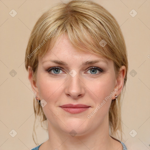 Joyful white young-adult female with medium  brown hair and blue eyes