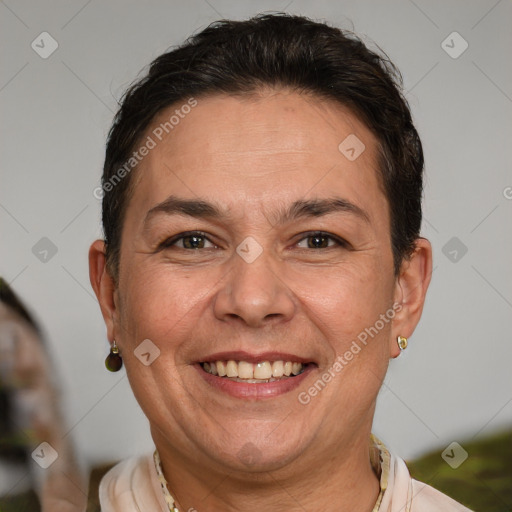 Joyful white adult female with short  brown hair and brown eyes