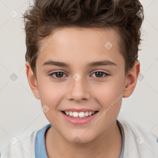 Joyful white child male with short  brown hair and brown eyes