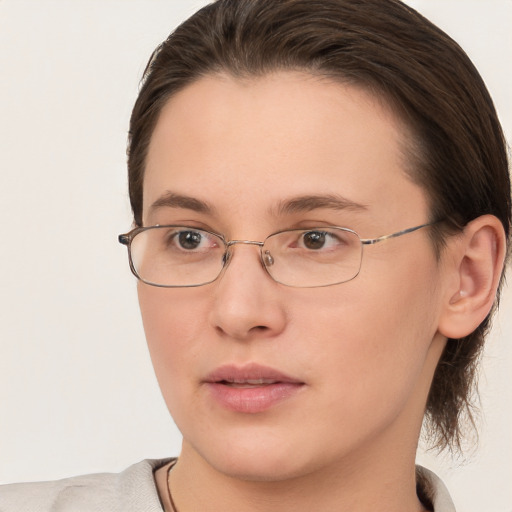 Neutral white young-adult female with medium  brown hair and brown eyes