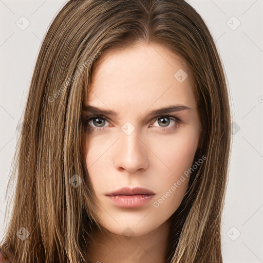 Neutral white young-adult female with long  brown hair and brown eyes