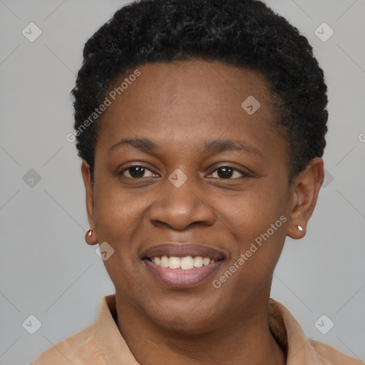 Joyful black young-adult female with short  brown hair and brown eyes