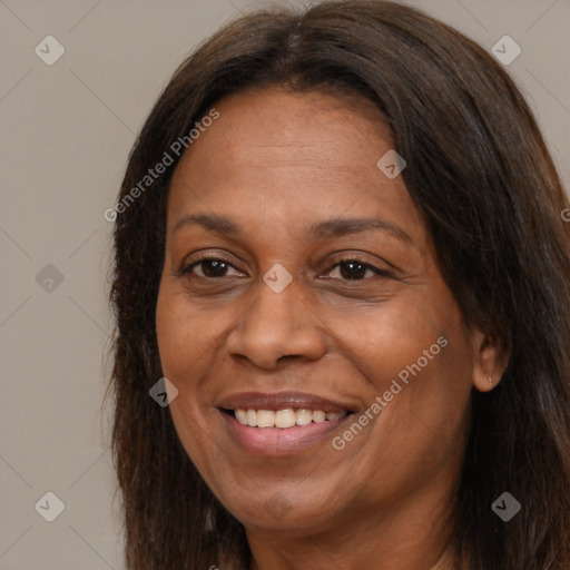 Joyful white adult female with long  brown hair and brown eyes