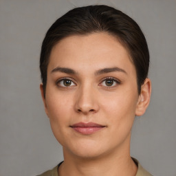 Neutral white young-adult female with short  brown hair and brown eyes