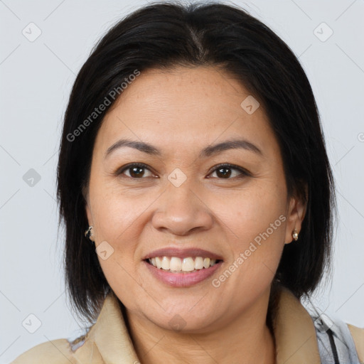 Joyful white young-adult female with medium  brown hair and brown eyes