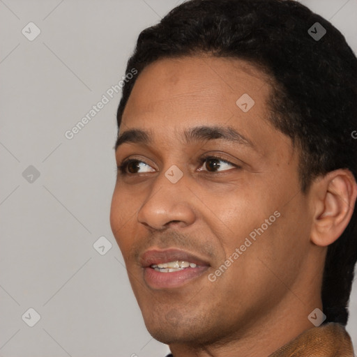 Joyful black young-adult male with short  black hair and brown eyes