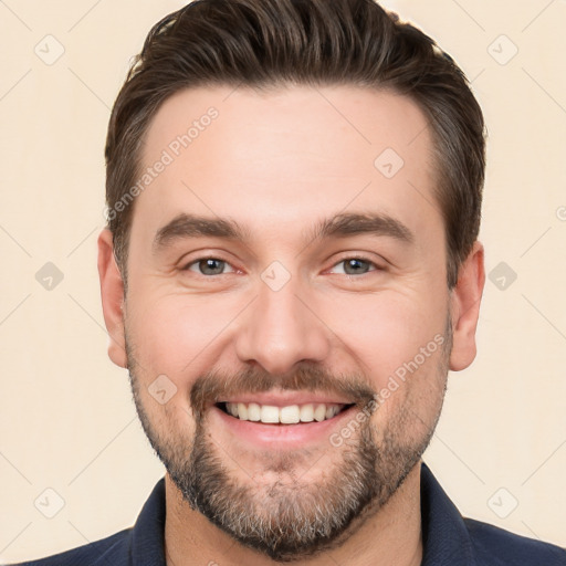 Joyful white young-adult male with short  brown hair and brown eyes