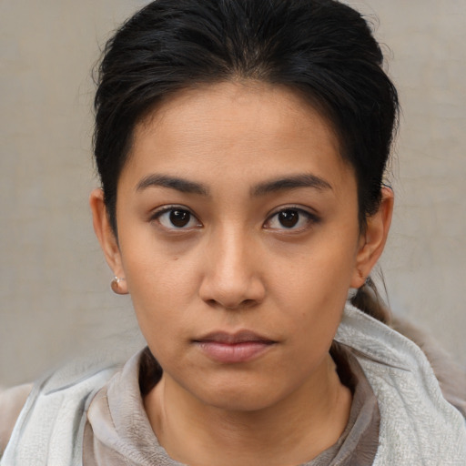 Neutral asian young-adult female with short  brown hair and brown eyes