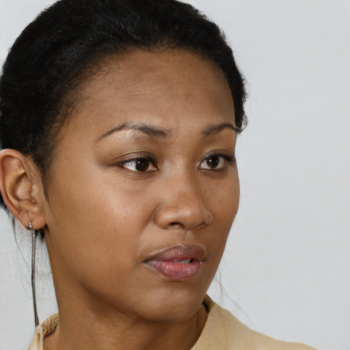 Neutral black young-adult female with short  brown hair and brown eyes
